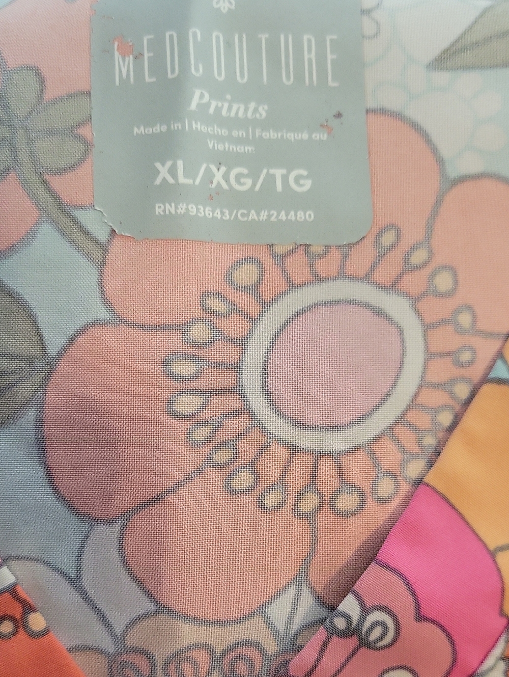 MEDCOUTURE Floral Print Scrub Top in Pastel Pink & Blue W Green Pants